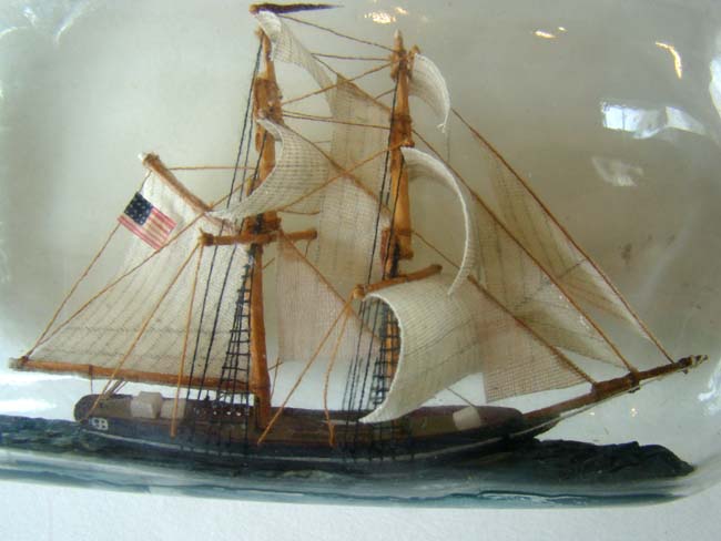 A very well made and attractive Two-Masted Ship-in-a Bottle